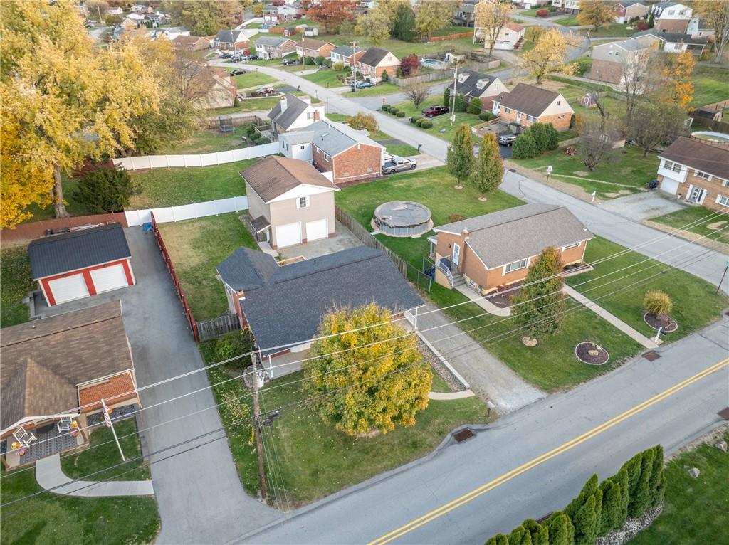 136 Long Drive Irwin, PA 15642 - Photo 48 of 50 an aerial view of a house with a garden and mountains