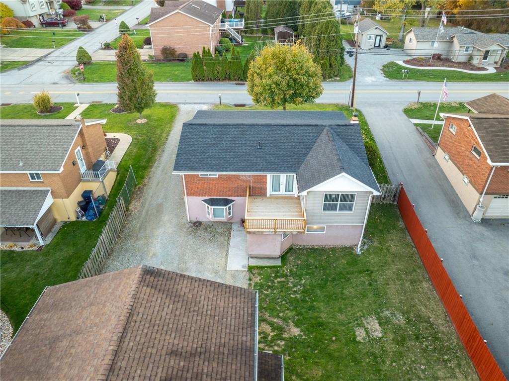 136 Long Drive Irwin, PA 15642 - Photo 49 of 50 an aerial view of a house with garden space and a car park
