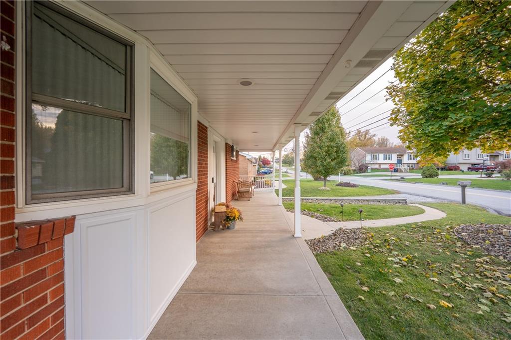 136 Long Drive Irwin, PA 15642 - Photo 5 of 50 a view of a swimming pool with a porch