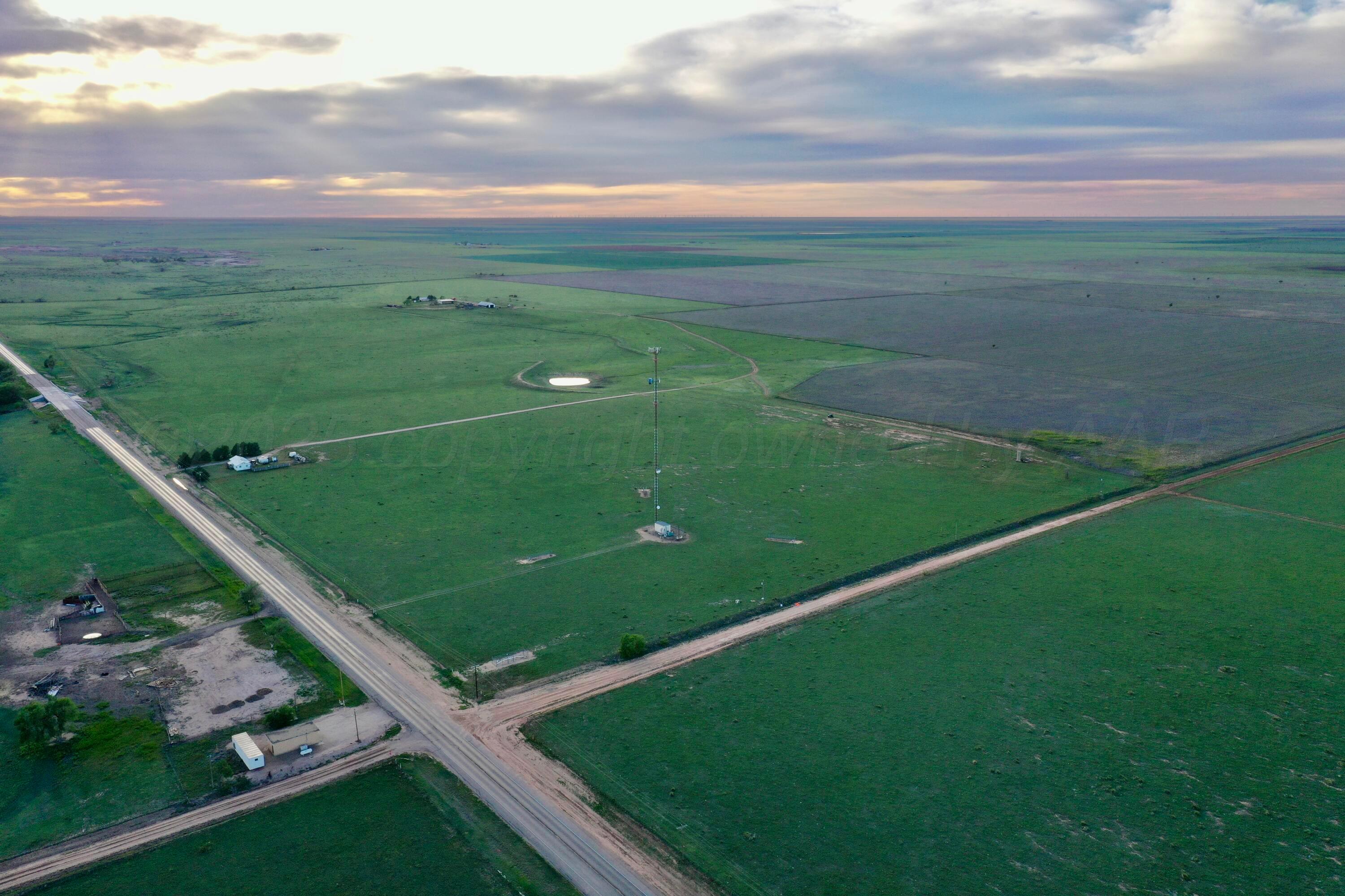 6675 Highway 86 Tulia, TX 79088 - Photo 30 of 68 a view of a golf course with a lake