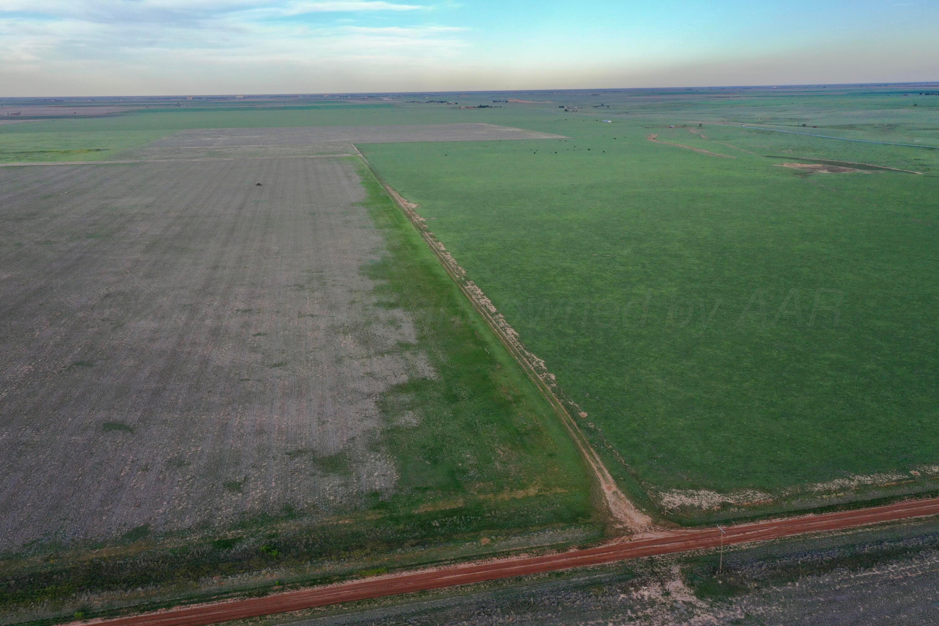 6675 Highway 86 Tulia, TX 79088 - Photo 35 of 68 a view of a golf course with a lake