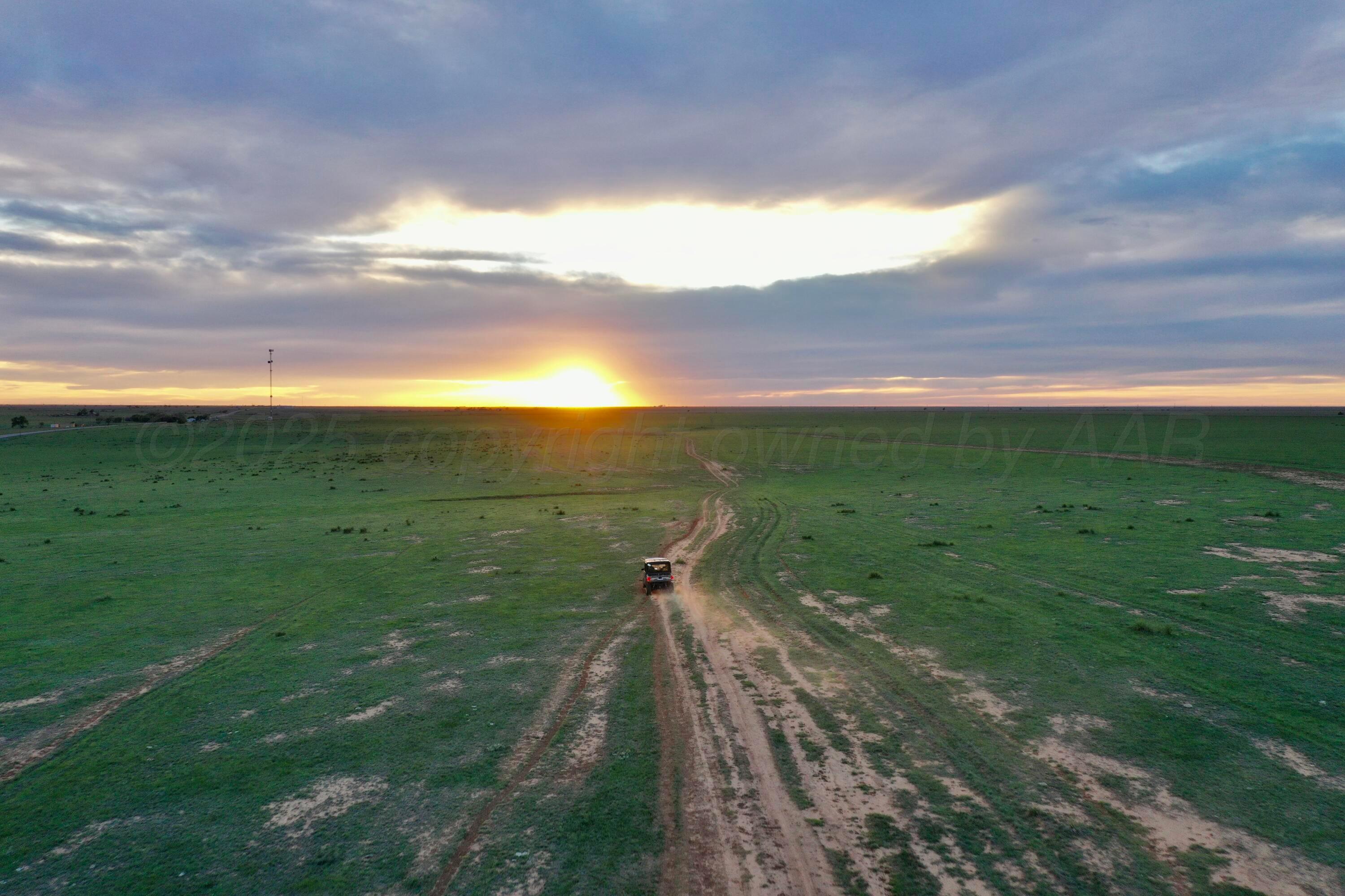 6675 Highway 86 Tulia, TX 79088 - Photo 48 of 68 a view of a lake with a yard