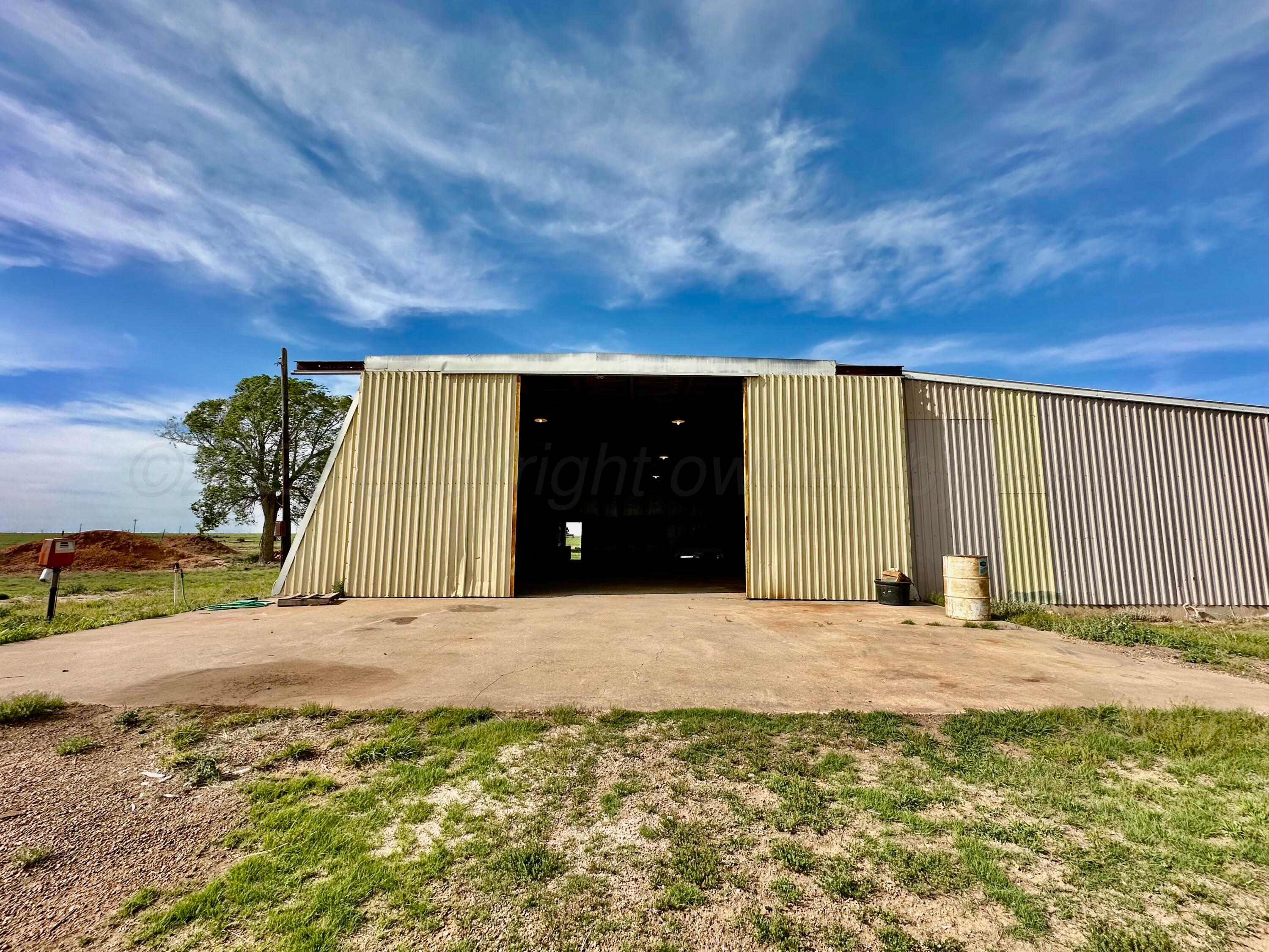 6675 Highway 86 Tulia, TX 79088 - Photo 60 of 68 a view of an outdoor space and a building