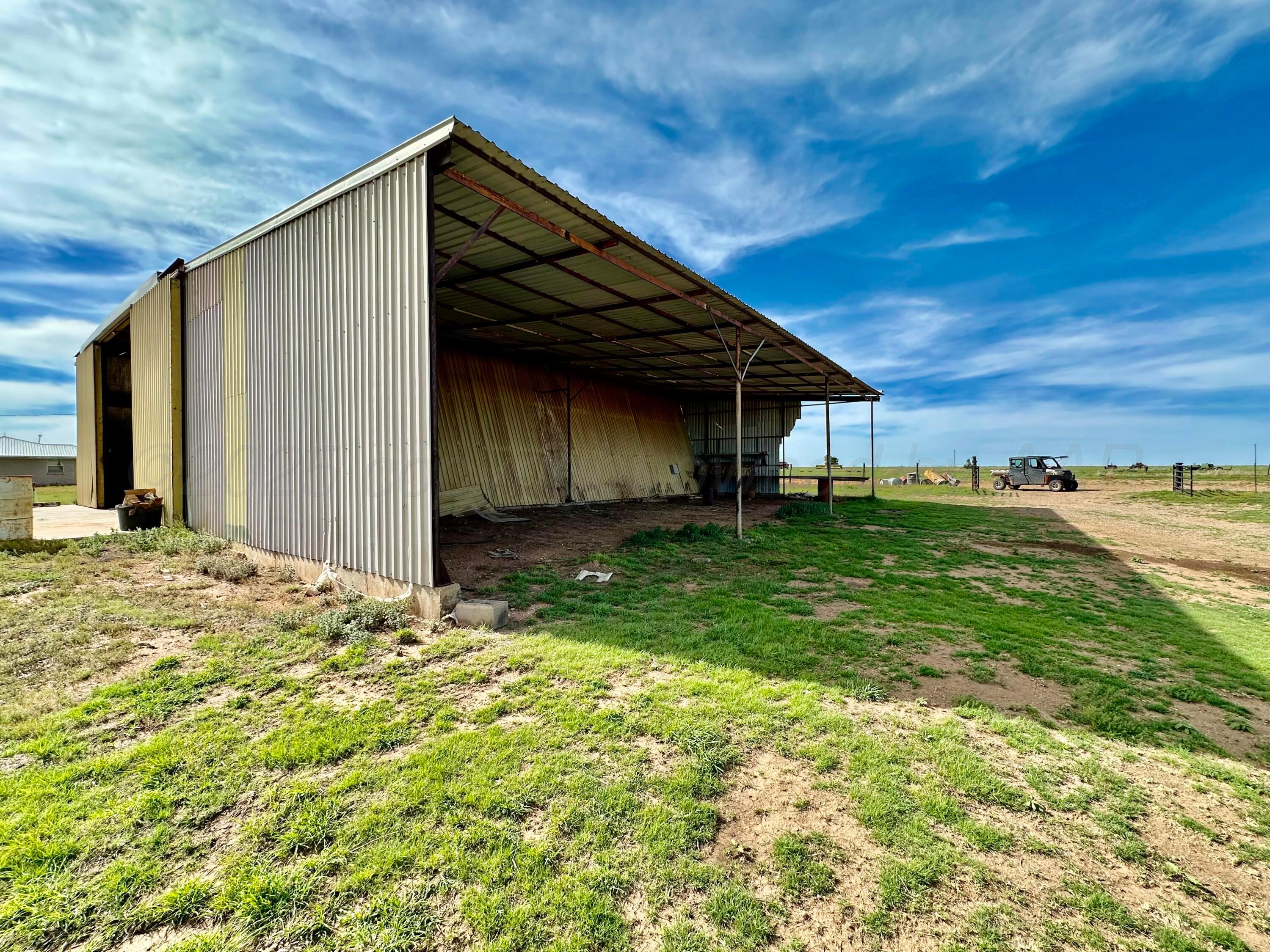 6675 Highway 86 Tulia, TX 79088 - Photo 61 of 68 a backyard of a house with lots of green space