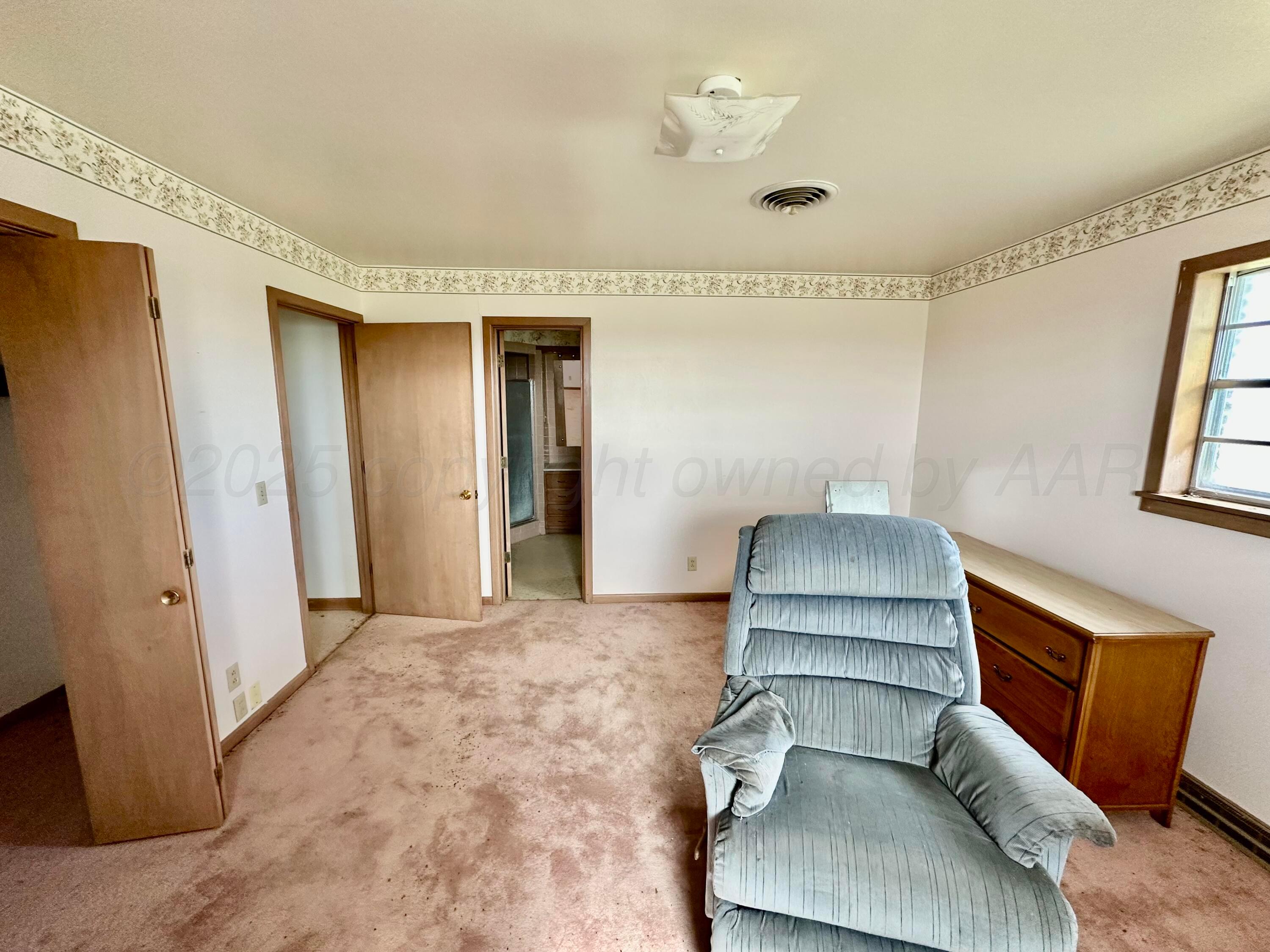 6675 Highway 86 Tulia, TX 79088 - Photo 65 of 68 a living room with furniture and a fireplace