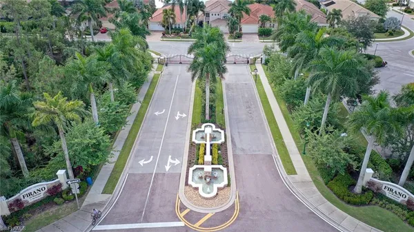 an aerial view of house with yard