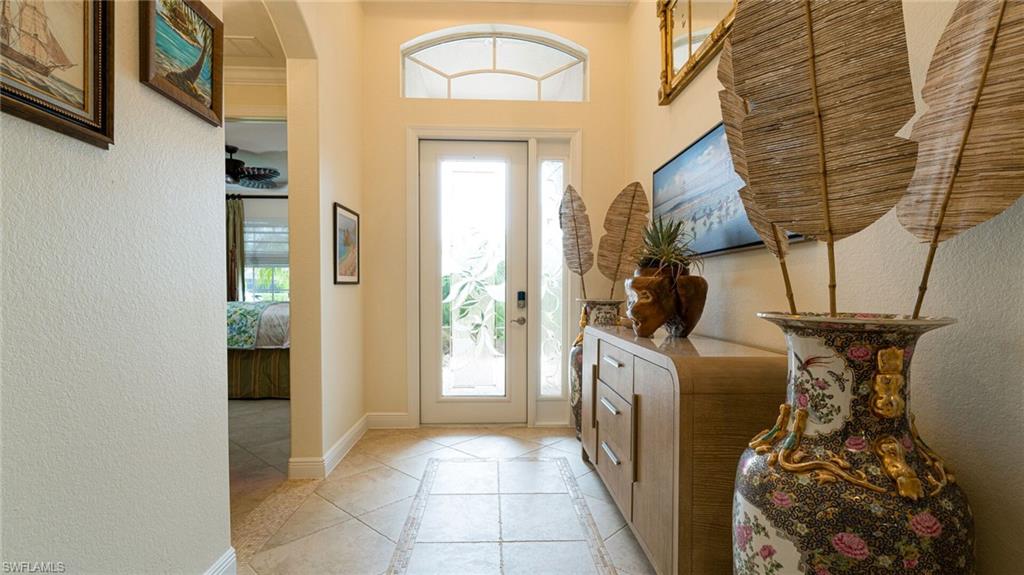 7667 Martino Circle Naples, FL 34112 - Photo 7 of 41 a view of a entryway door of the house