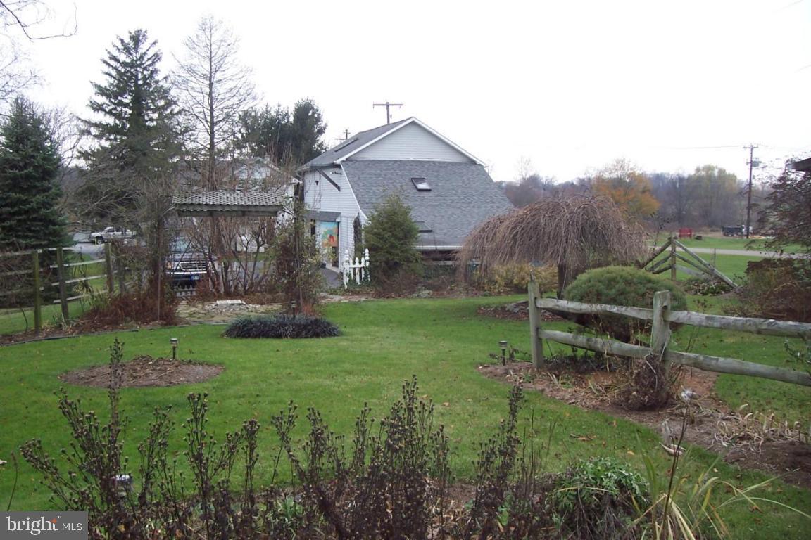 172 Oak Bottom Road Quarryville, PA 17566 - Photo 14 of 17 a view of house with a big yard