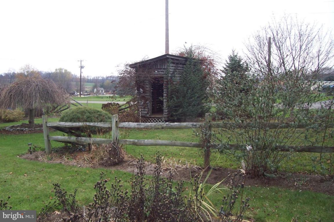 172 Oak Bottom Road Quarryville, PA 17566 - Photo 15 of 17 a view of a house with a yard