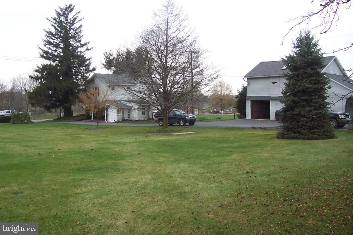172 Oak Bottom Road Quarryville, PA 17566 - Photo 17 of 17 a view of a yard in front of a house