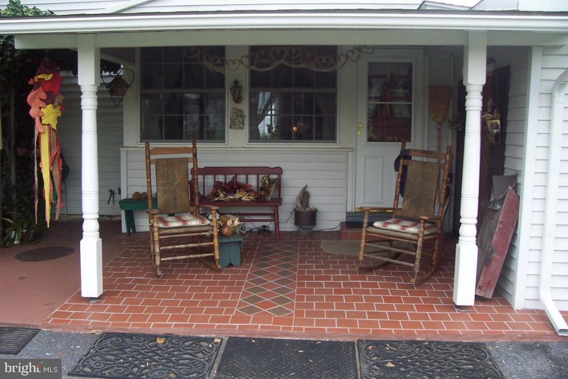 172 Oak Bottom Road Quarryville, PA 17566 - Photo 3 of 17 an outdoor view of a house with outdoor seating