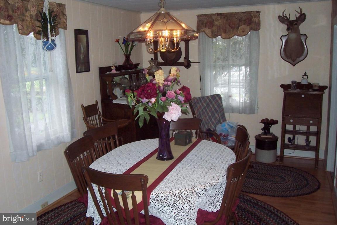 172 Oak Bottom Road Quarryville, PA 17566 - Photo 5 of 17 a dining room with furniture and window