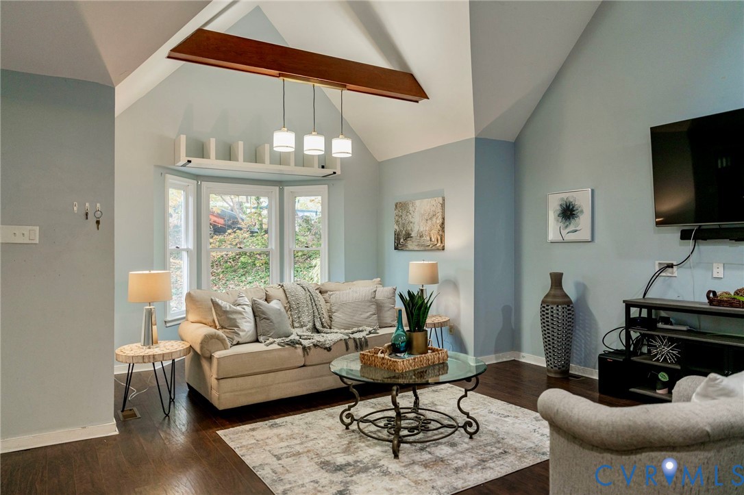 8603 Boones Bluff Mews, Unit MEWS Chesterfield, VA 23832 - Photo 1 of 46 a living room with furniture a dining table and a large window