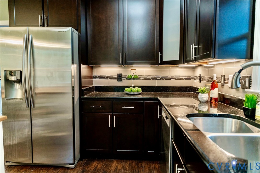 8603 Boones Bluff Mews, Unit MEWS Chesterfield, VA 23832 - Photo 13 of 46 a kitchen with a sink a refrigerator and cabinets