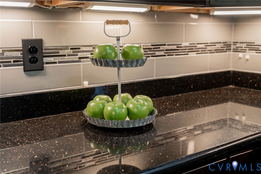 8603 Boones Bluff Mews, Unit MEWS Chesterfield, VA 23832 - Photo 14 of 46 a kitchen with a stove and cabinets