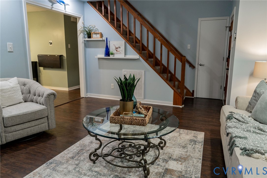 8603 Boones Bluff Mews, Unit MEWS Chesterfield, VA 23832 - Photo 2 of 46 a living room with furniture and a wooden floor
