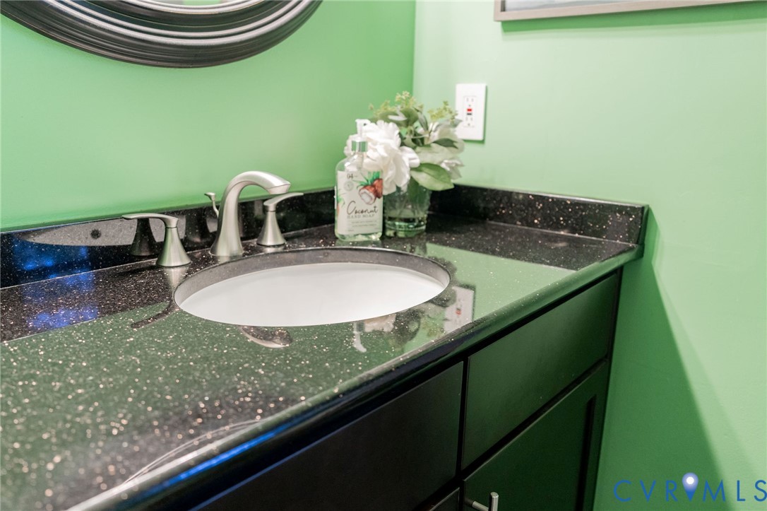 8603 Boones Bluff Mews, Unit MEWS Chesterfield, VA 23832 - Photo 26 of 46 a bathroom with a sink and a mirror