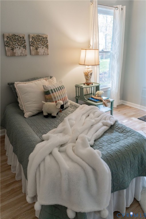 8603 Boones Bluff Mews, Unit MEWS Chesterfield, VA 23832 - Photo 30 of 46 a bedroom with a bed and window