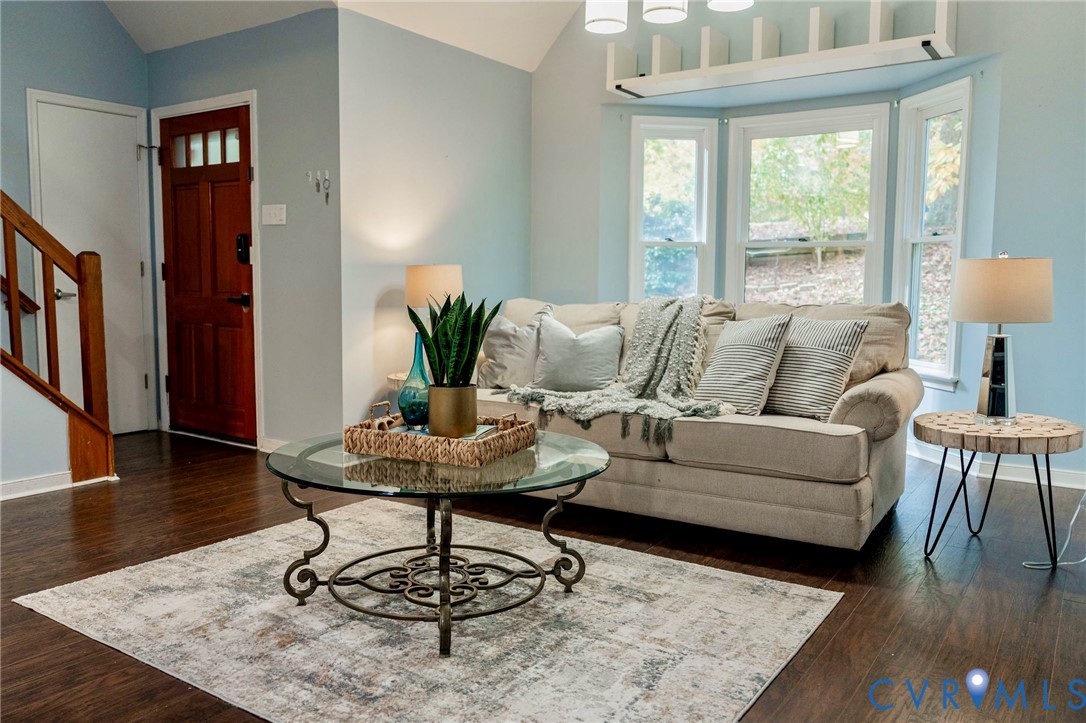8603 Boones Bluff Mews, Unit MEWS Chesterfield, VA 23832 - Photo 3 of 46 a living room with furniture a table and a potted plant
