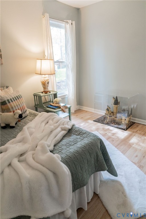 8603 Boones Bluff Mews, Unit MEWS Chesterfield, VA 23832 - Photo 31 of 46 a bedroom with a bed and window