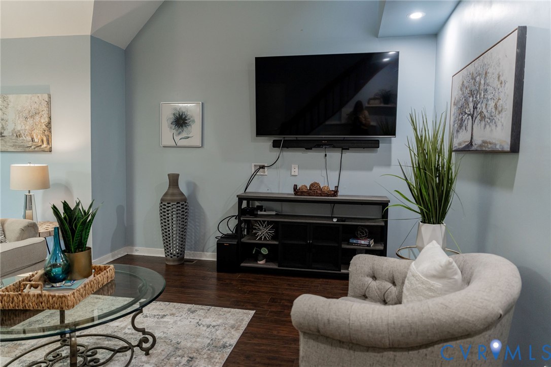 8603 Boones Bluff Mews, Unit MEWS Chesterfield, VA 23832 - Photo 4 of 46 a living room with furniture and a flat screen tv