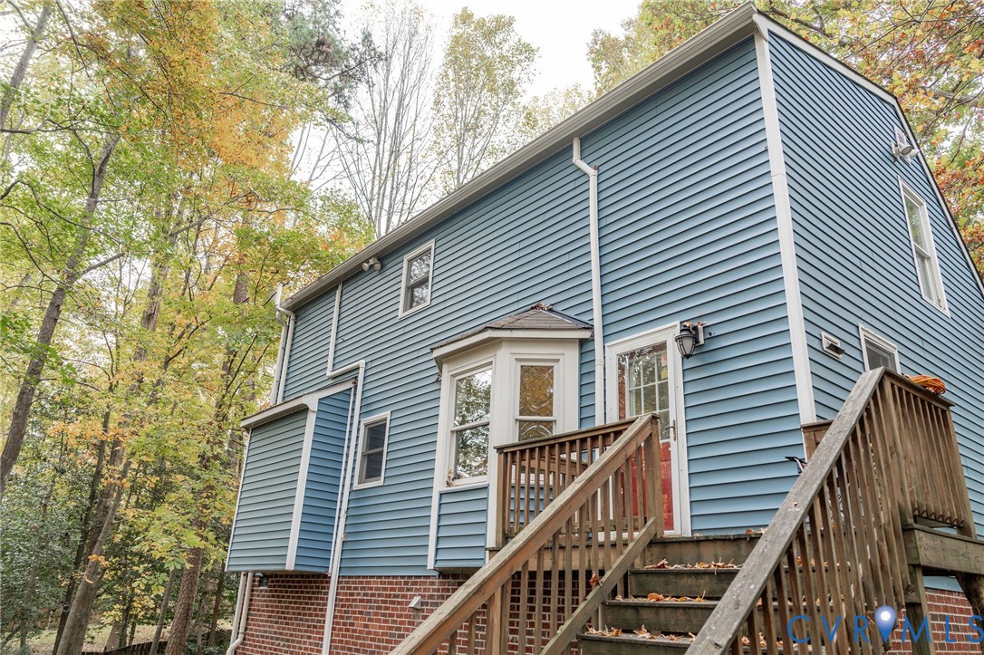 8603 Boones Bluff Mews, Unit MEWS Chesterfield, VA 23832 - Photo 46 of 46 a view of a house with a trees