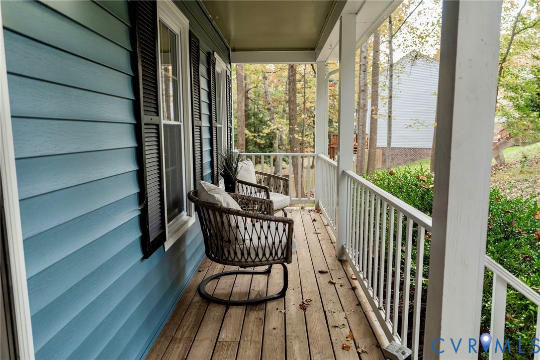 8603 Boones Bluff Mews, Unit MEWS Chesterfield, VA 23832 - Photo 7 of 46 a view of balcony with wooden floor