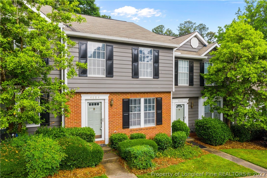 4604 Pine Trace Drive Raleigh, NC 27613 - Photo 2 of 30 a front view of a house with garden