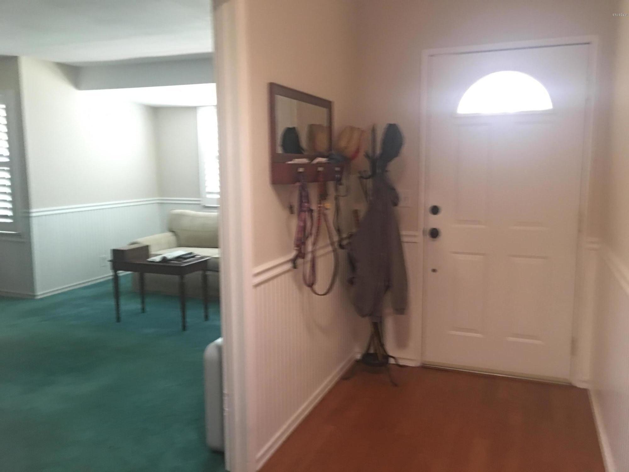 718 Tranquil Lane Simi Valley, CA 93065 - Photo 19 of 68 a view of a livingroom with furniture and front door