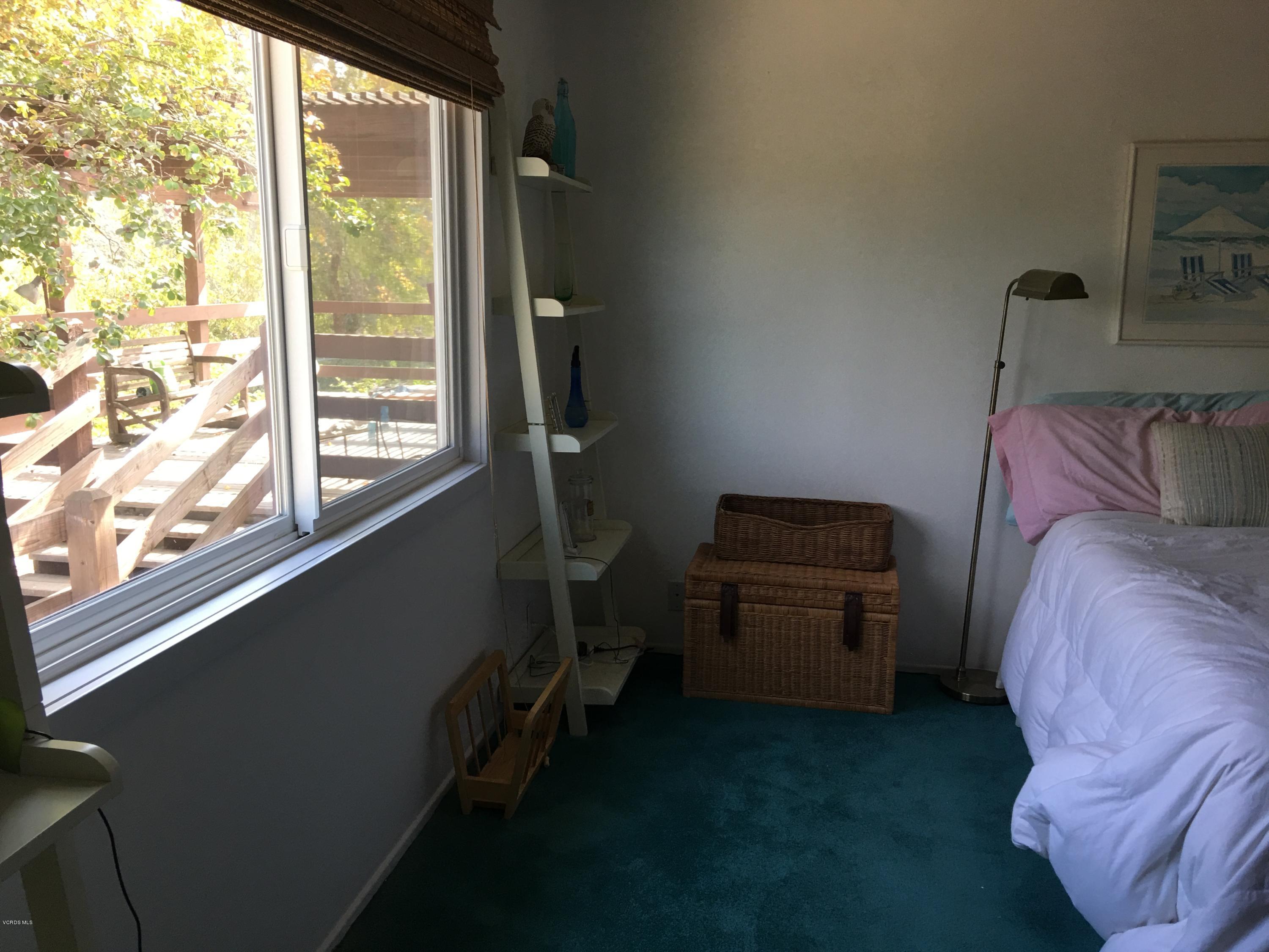 718 Tranquil Lane Simi Valley, CA 93065 - Photo 29 of 68 a bedroom with a bed and a window