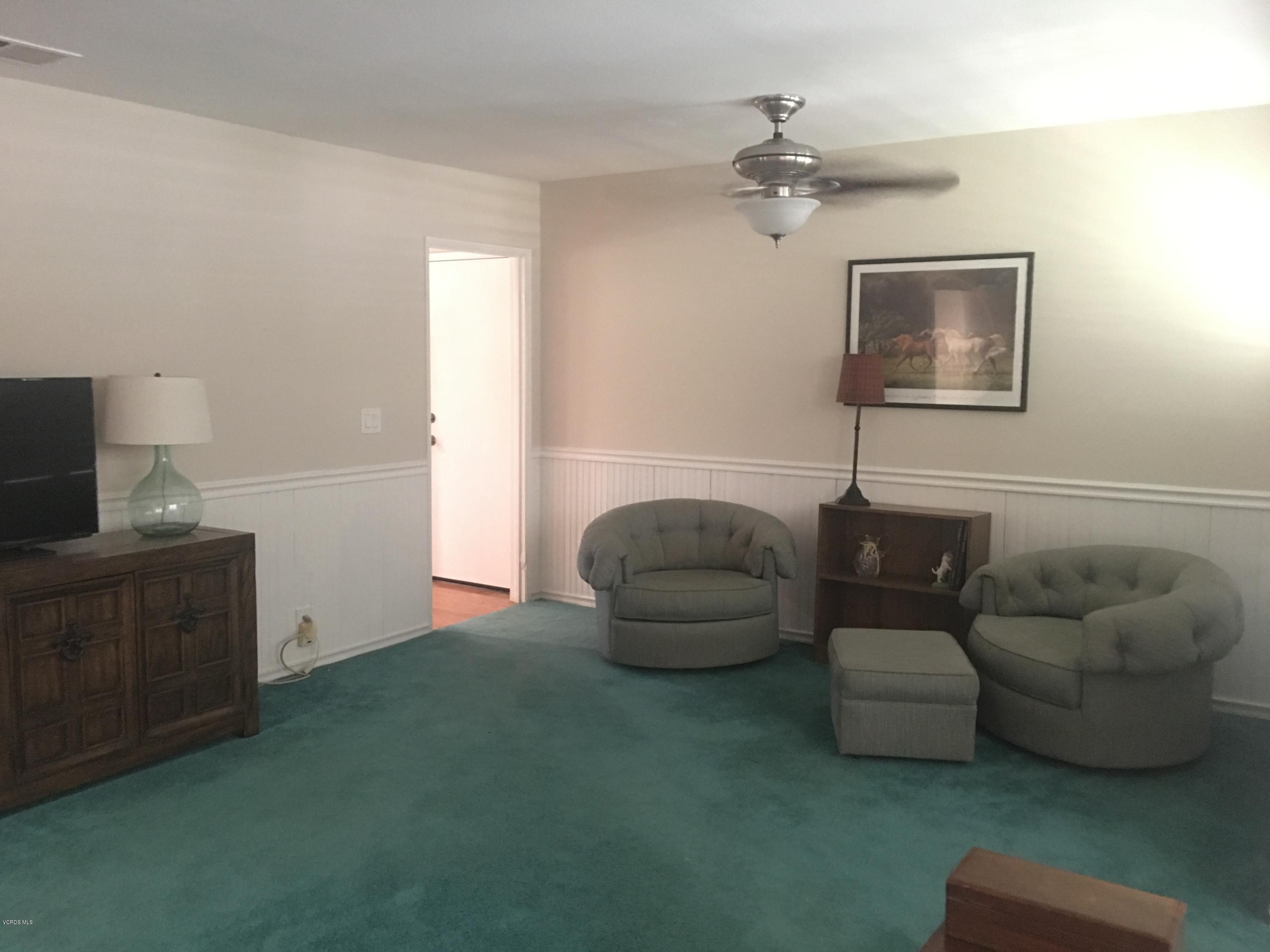 718 Tranquil Lane Simi Valley, CA 93065 - Photo 5 of 68 a living room with furniture and a flat screen tv