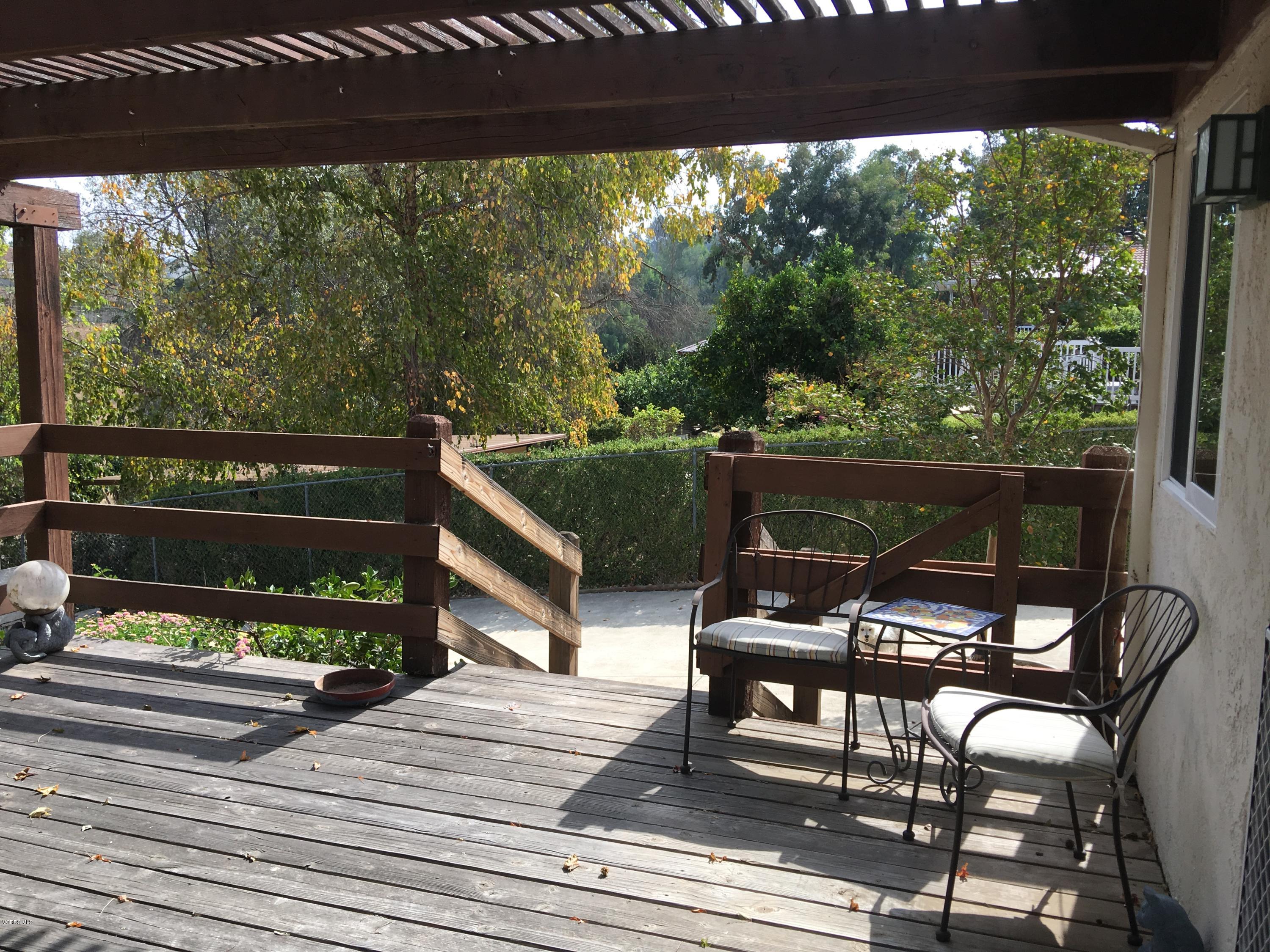 718 Tranquil Lane Simi Valley, CA 93065 - Photo 41 of 68 a view of a bench in a patio