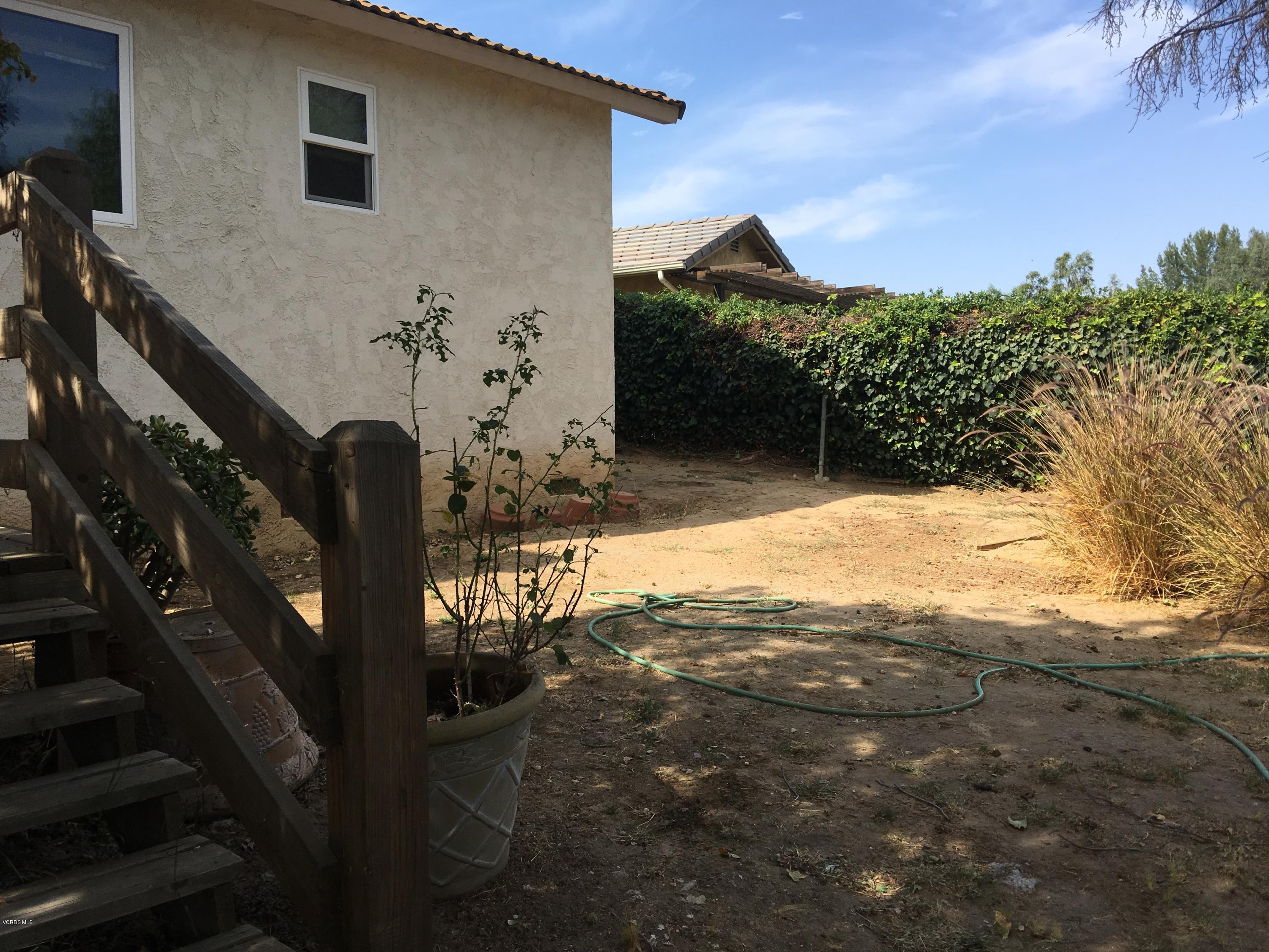 718 Tranquil Lane Simi Valley, CA 93065 - Photo 45 of 68 a view of house with backyard