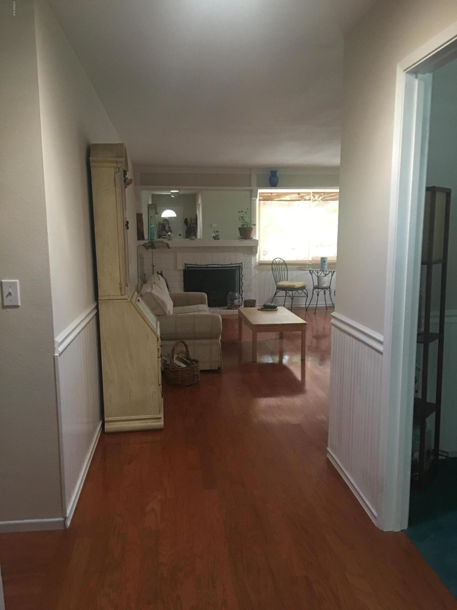 718 Tranquil Lane Simi Valley, CA 93065 - Photo 7 of 68 a living room with furniture and a window