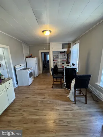 front view of a building with a yard