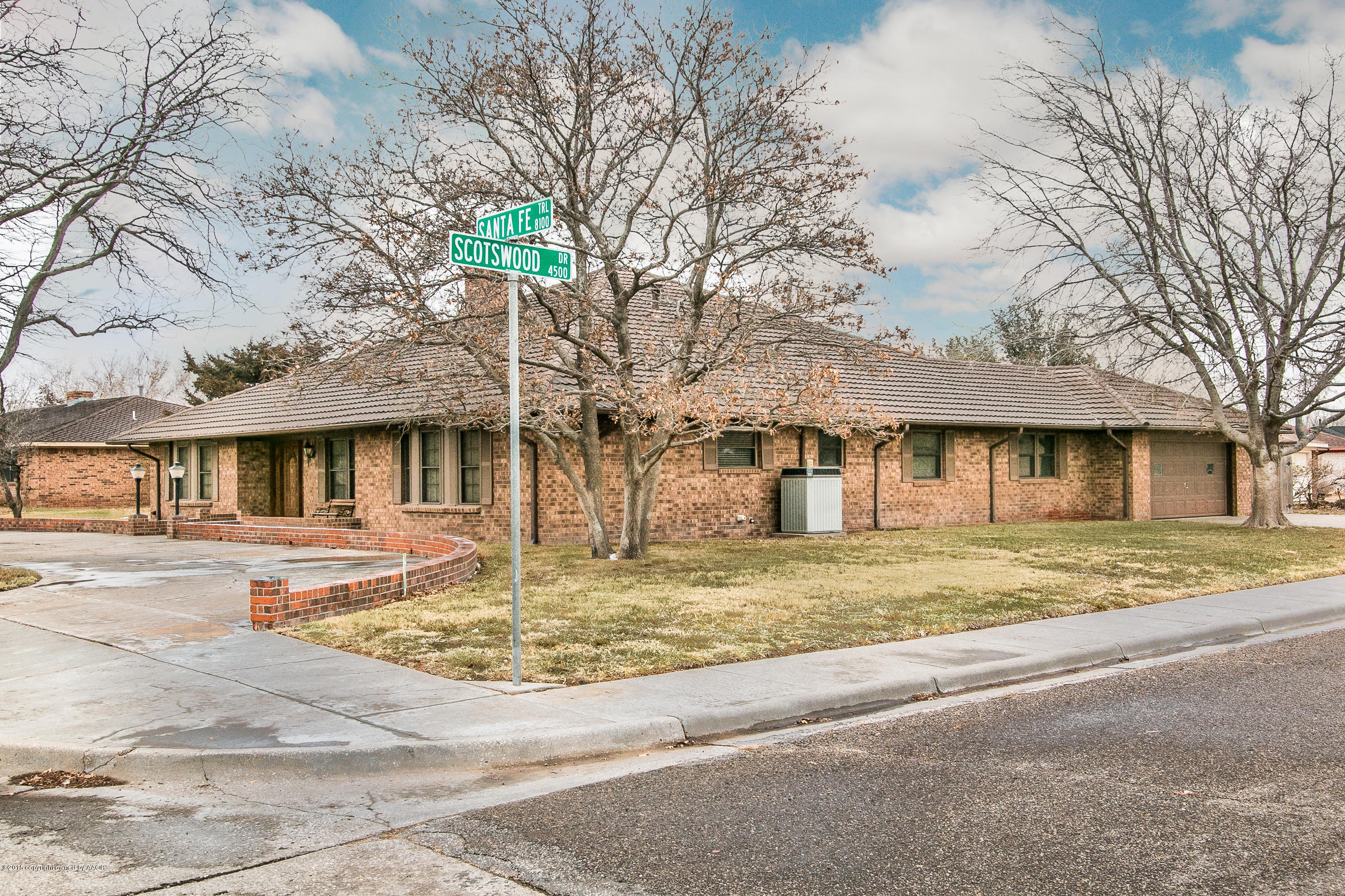 8117 Santa Fe Trail Amarillo, TX 79110 - Photo 2 of 27 a view of a house with a yard