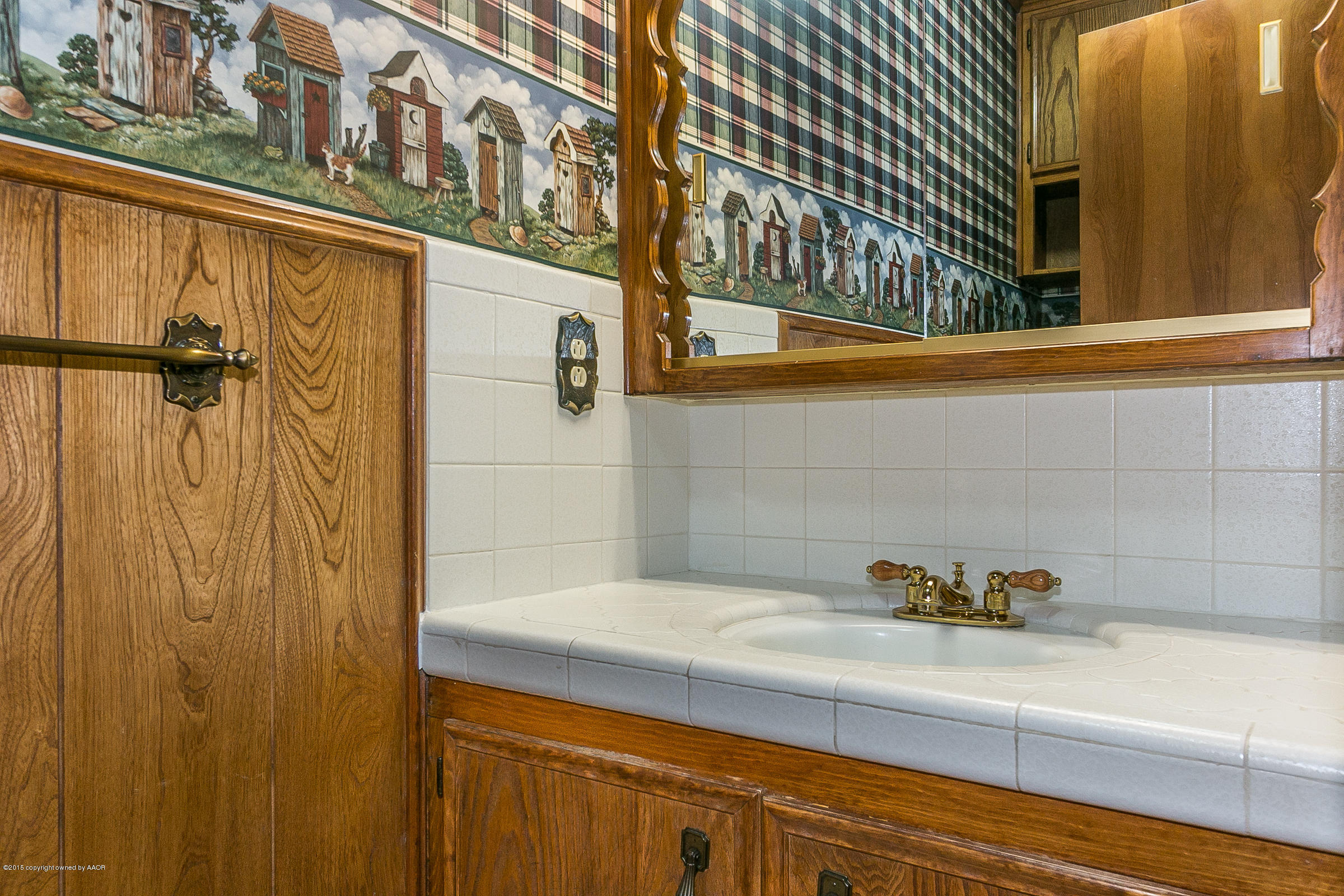 8117 Santa Fe Trail Amarillo, TX 79110 - Photo 22 of 27 a bathroom with a shower and a sink