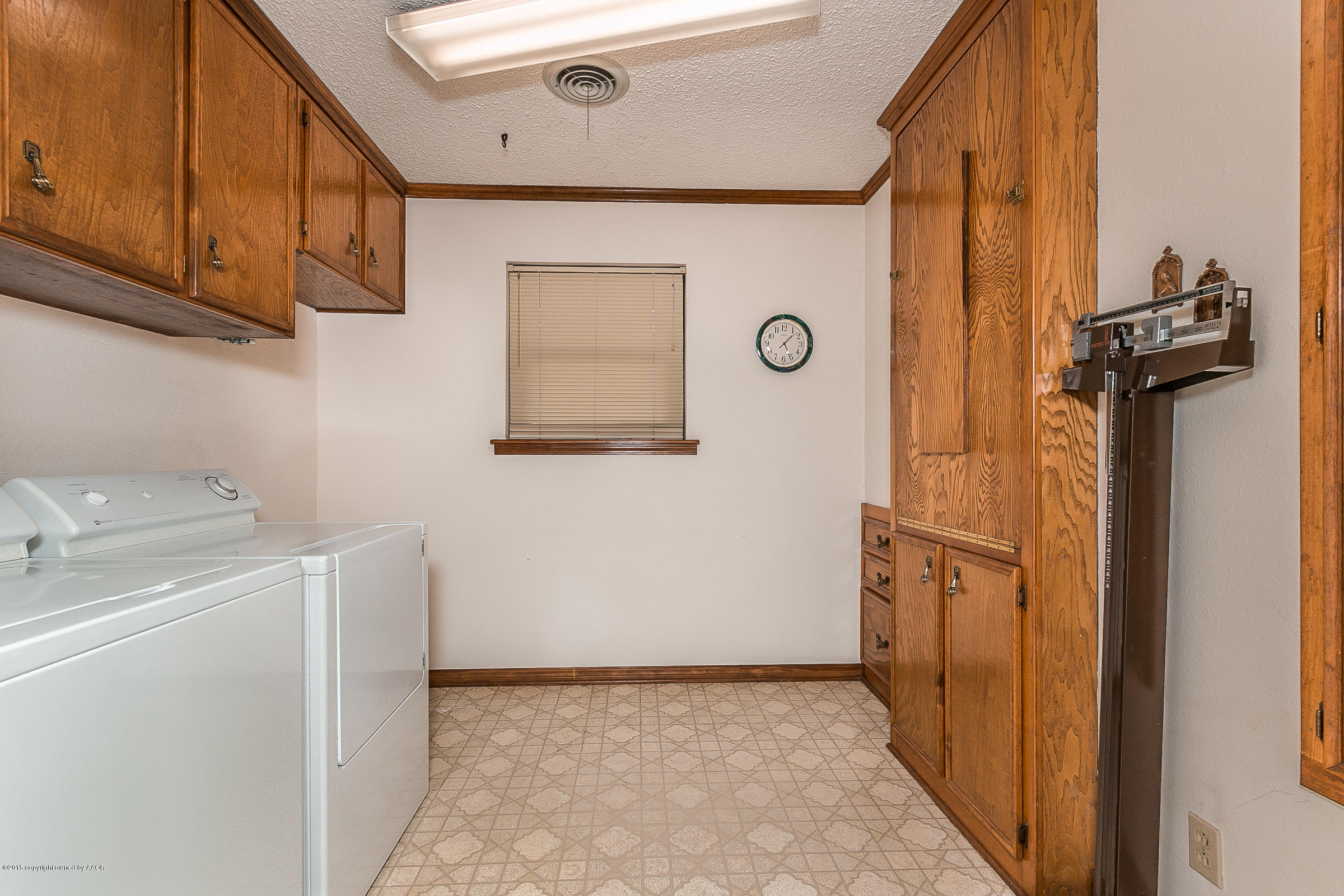 8117 Santa Fe Trail Amarillo, TX 79110 - Photo 23 of 27 a view of a storage & utility room with a sink