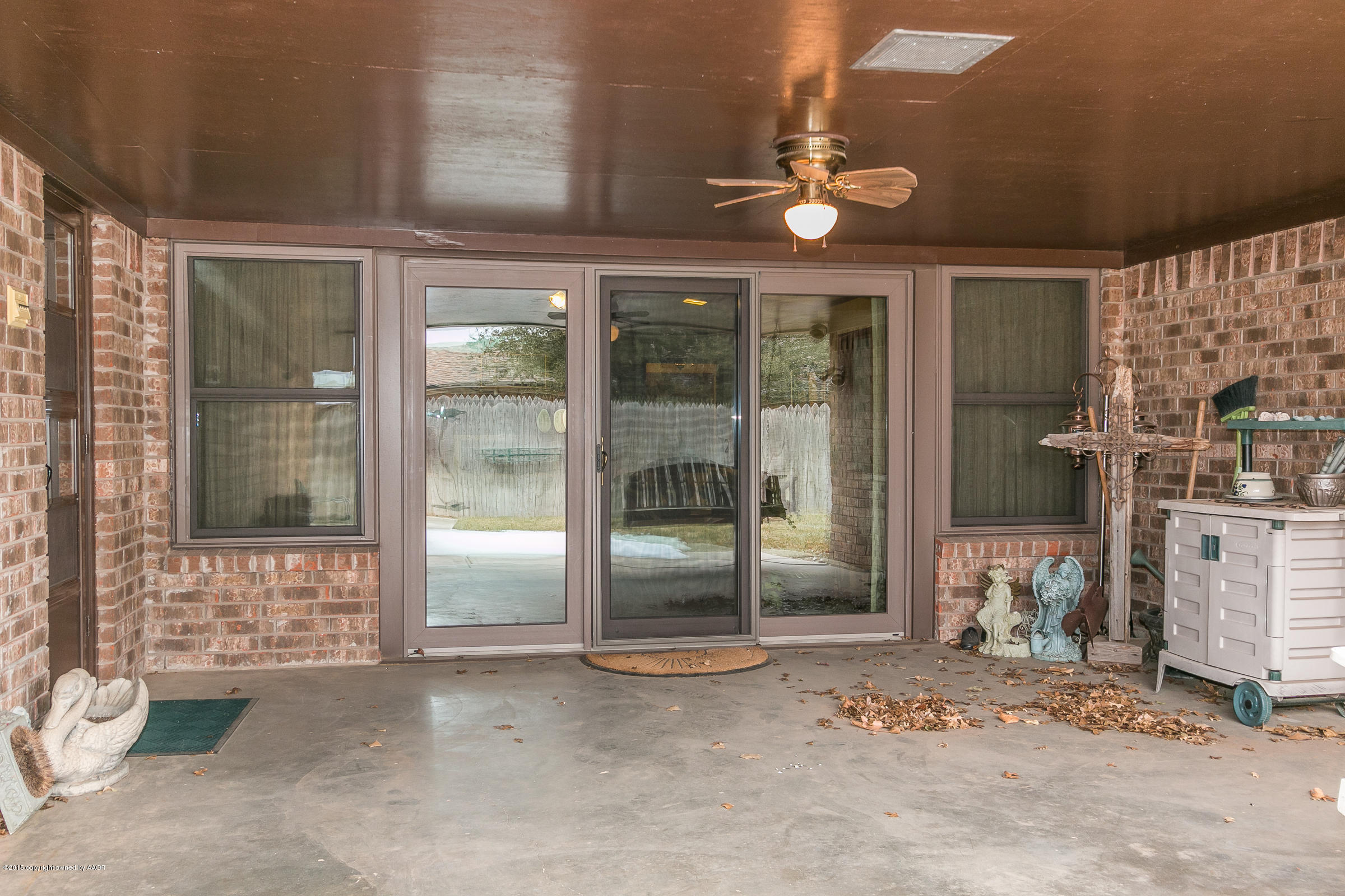 8117 Santa Fe Trail Amarillo, TX 79110 - Photo 24 of 27 a view of a room with a large window and chandelier