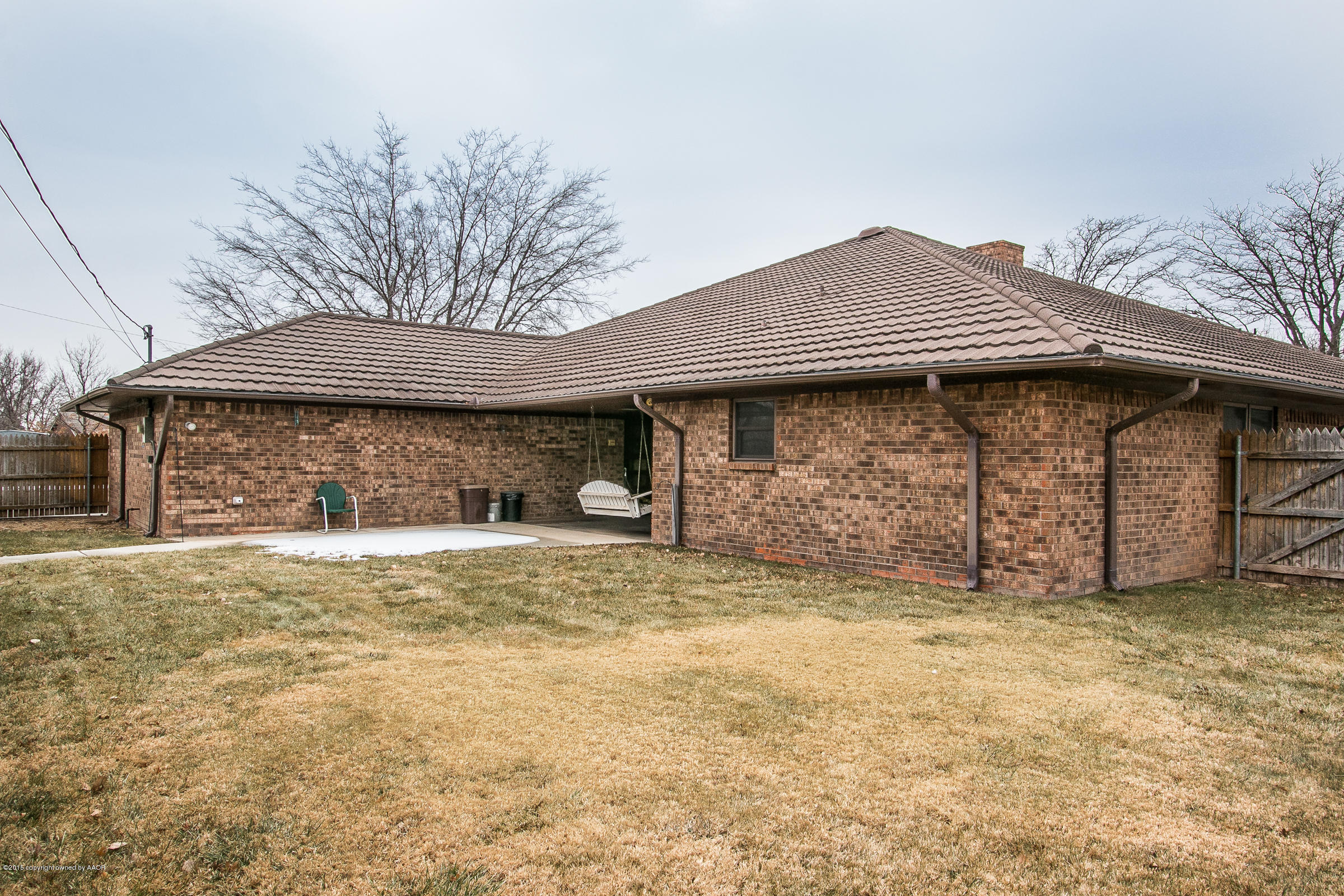 8117 Santa Fe Trail Amarillo, TX 79110 - Photo 27 of 27 a view of a house with a large window and yard