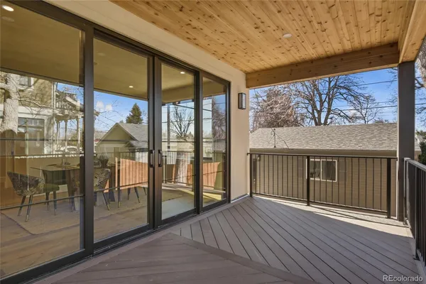 a view of a large window with wooden floor