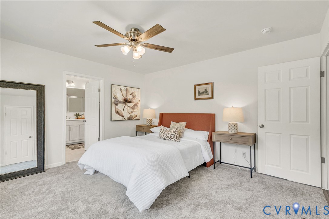 9424 Marlfield Road Gloucester, VA 23061 - Photo 19 of 31 a bedroom with a bed and window