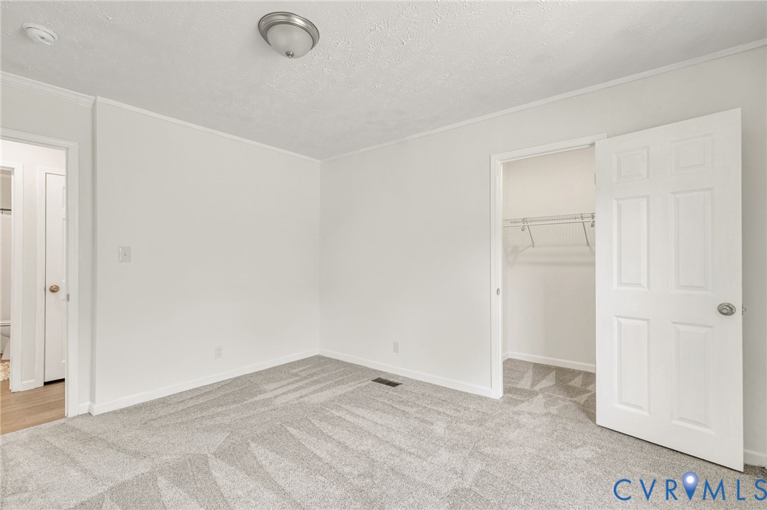 9424 Marlfield Road Gloucester, VA 23061 - Photo 23 of 31 a view of a room with an empty space