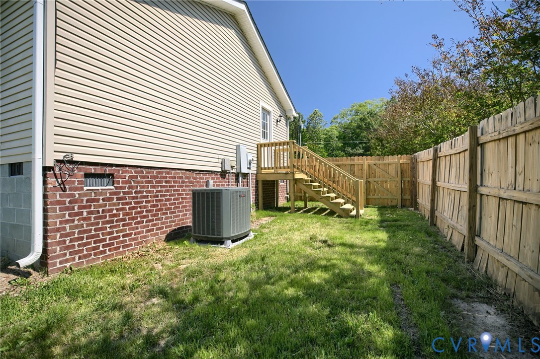 9424 Marlfield Road Gloucester, VA 23061 - Photo 28 of 31 a view of backyard of house with green space
