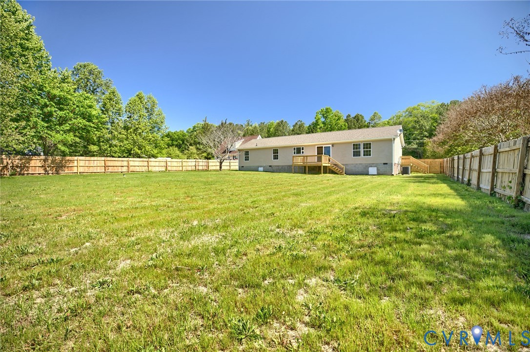 9424 Marlfield Road Gloucester, VA 23061 - Photo 30 of 31 a large house with a yard