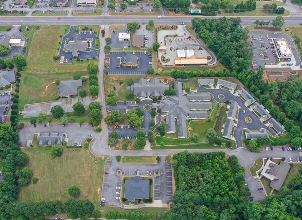 120 Perpetual Square Drive Anderson, SC 29621 - Photo 10 of 14 An aerial perspective showcases a comprehensive community layout with ample parking and surrounding green spaces.