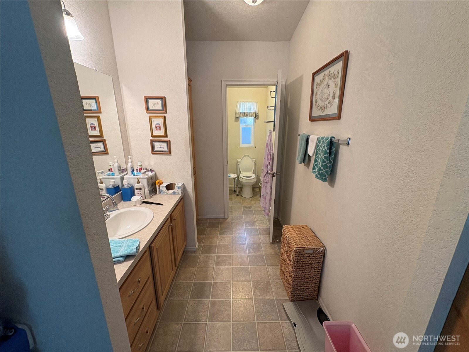 51 Meander Way Aberdeen, WA 98520 - Photo 11 of 22 a bathroom with sink and mirror