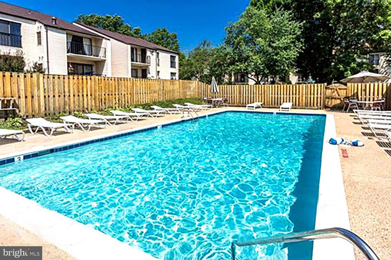 2574 Riva Road, Unit 12A Annapolis, MD 21401 - Photo 25 of 33 a view of a house with a yard