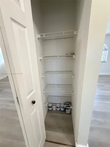 a bathroom with a tub and a shower