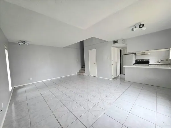 a view of a kitchen with a sink